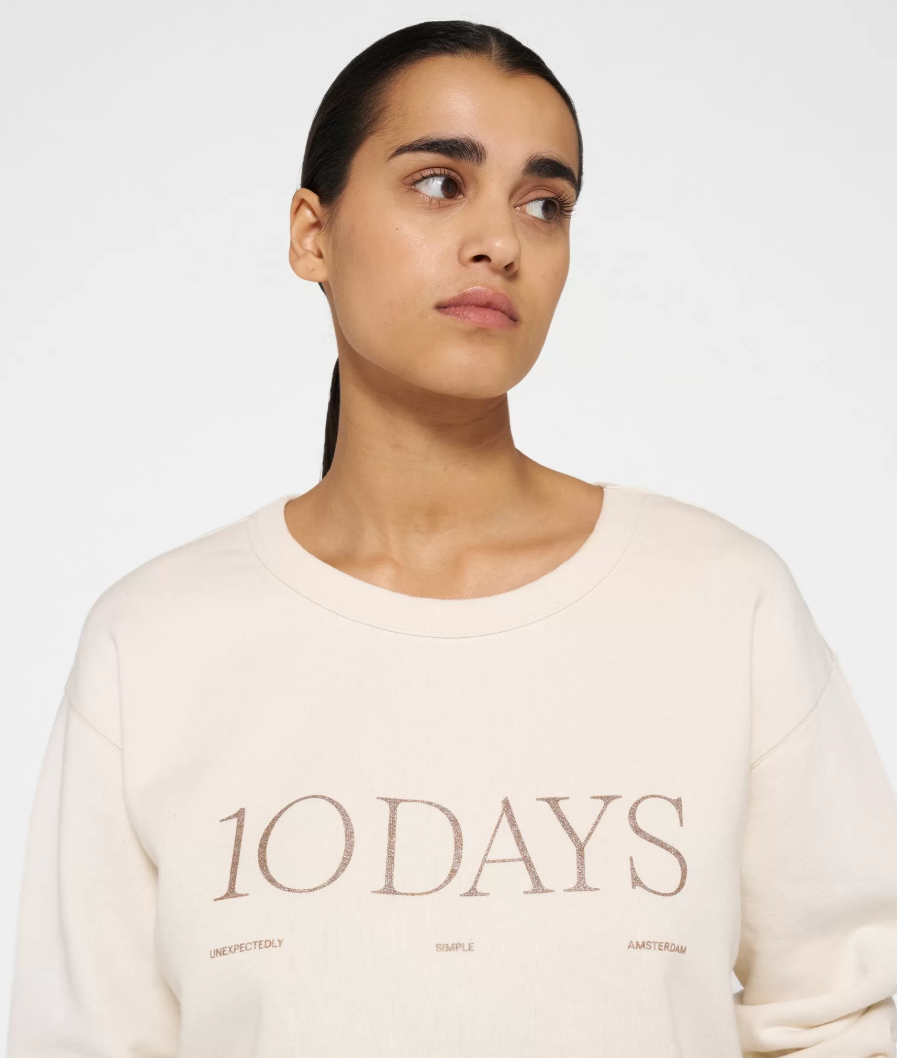 10DAYS sweater logo